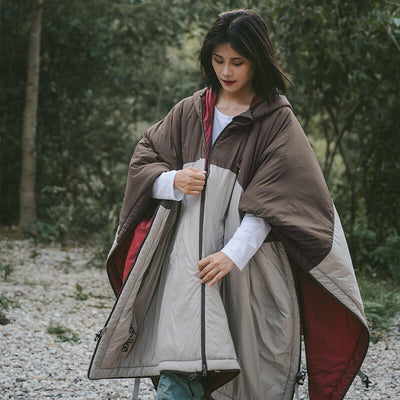 Poncho style sleeping bag coat