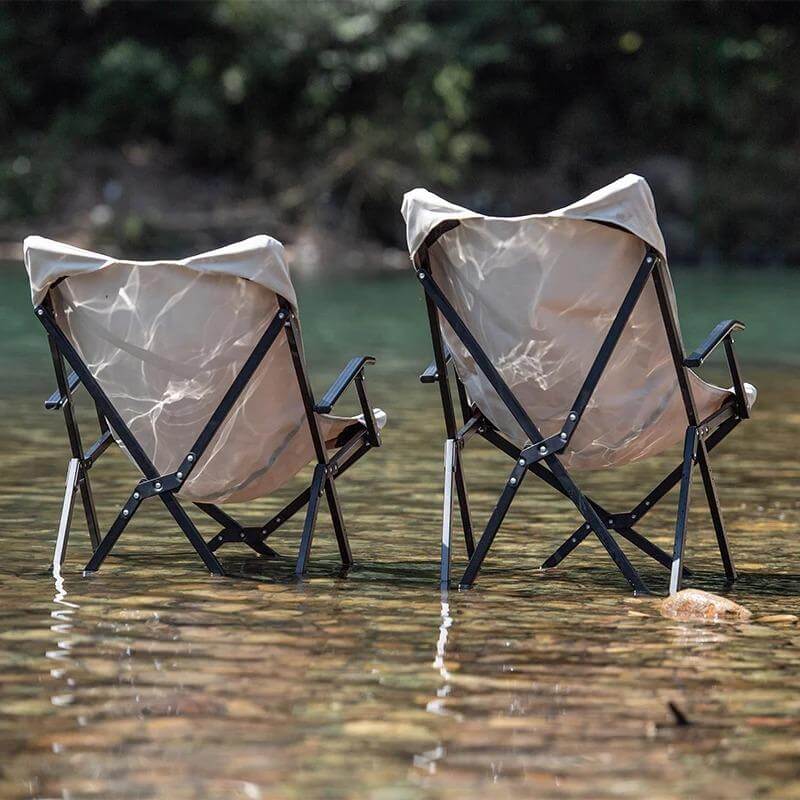 Folding moon chair with armrests